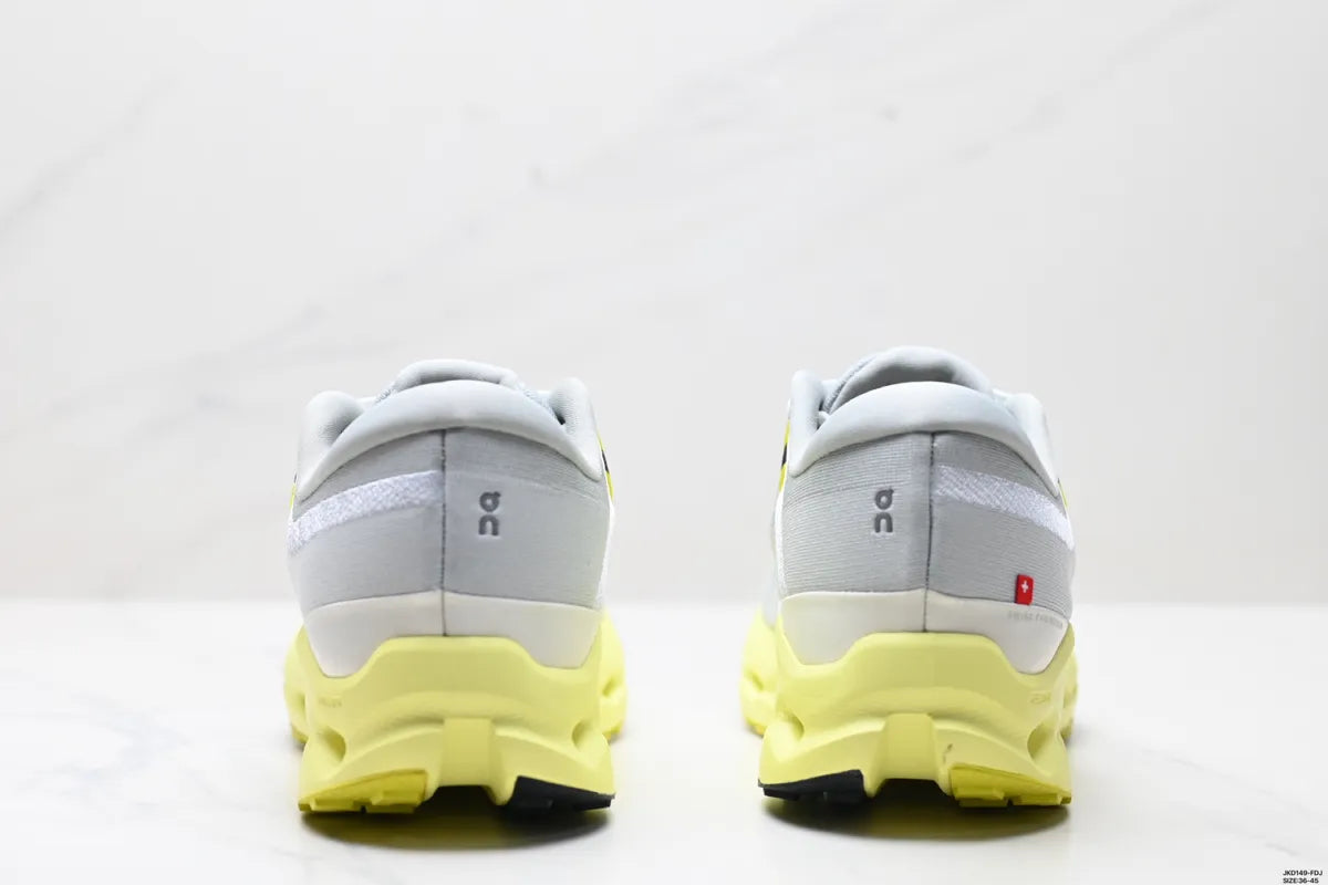 on running cloudsurfer 2 zapatillas naranjas y rojas